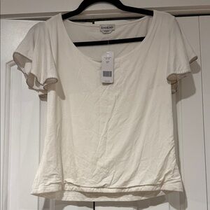 Bebe Ivory flutter sleeve Short Sleeve Top large NWT